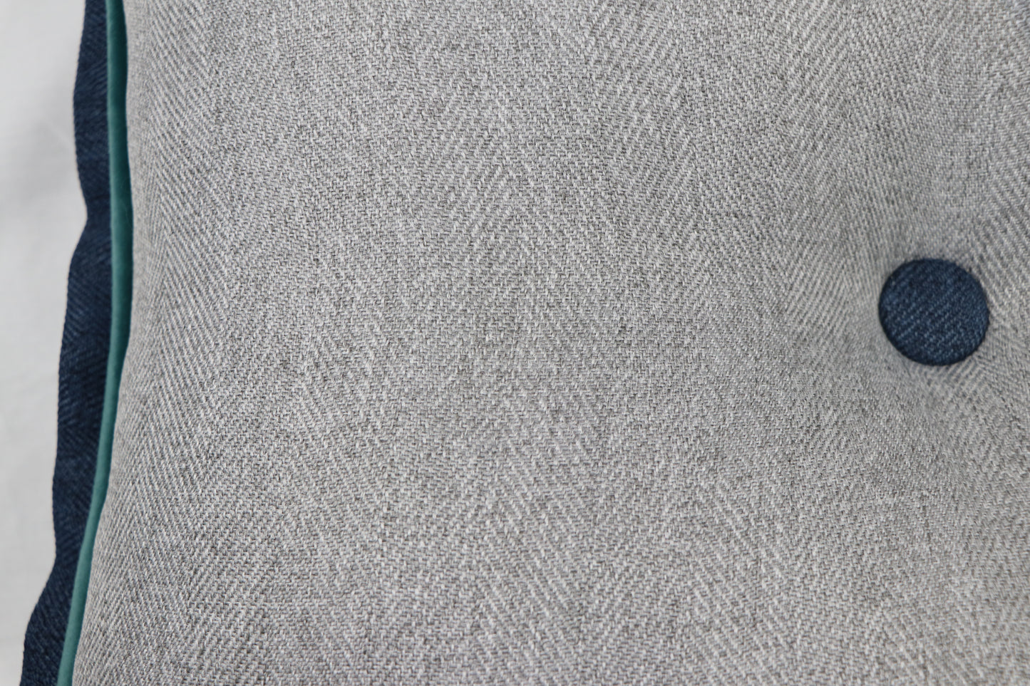 HERRINGBONE PATTERNED DECORATIVE PILLOW WITH PIPE AND BUTTONS